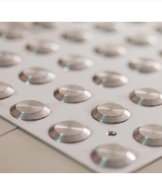 Stainless steel tactile stud
